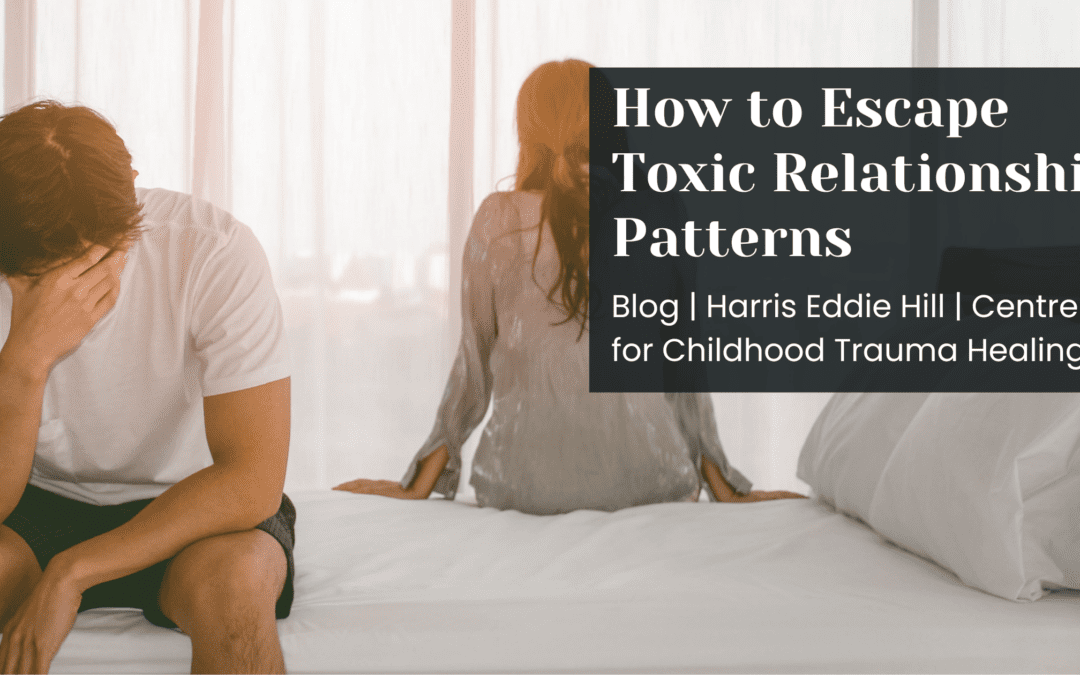 "How to Escape Toxic Relationship Patterns" Two people sitting on a bed, looking away from each other, with head in hands.