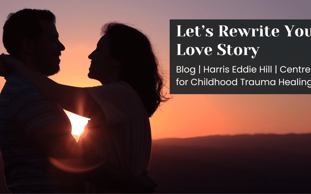 Silouhette of a couple hugging with a sunset in the background